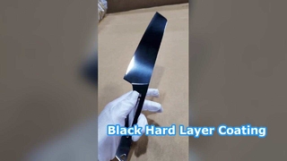 Vacuum coating with a black hard layer