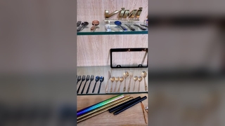 Vacuum coating machine for coating stainless steel tableware